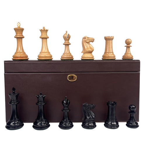 Wooden chess pieces with a brown storage box on a white background