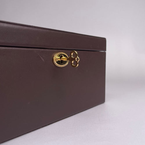 Brown box with a gold lock on a light grey background 