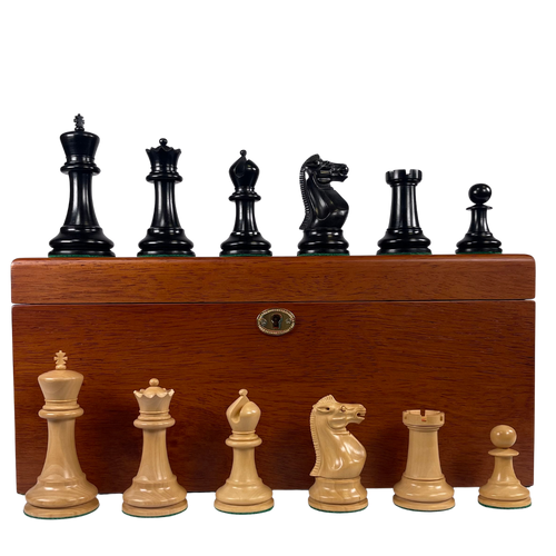 Wooden chess pieces with a wooden box on a white background