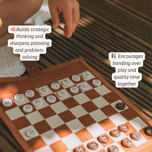 Hands playing chess on a roll-up leather travel chess set designed for strategic thinking and problem-solving. 
