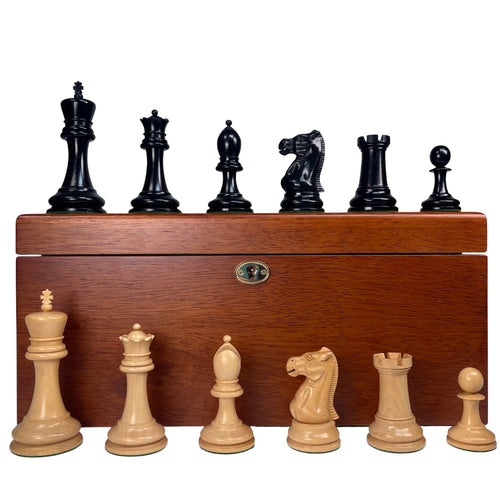 Wooden chess set with black and white pieces on a white background