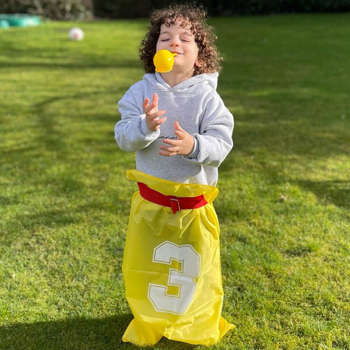  Boy playing with sports day activity set