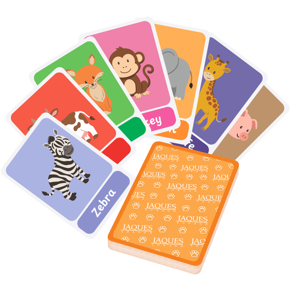 A set of colourful animal-themed cards and a matching orange card deck box on a solid dark green background. The cards feature cartoon illustrations of a zebra, fox, monkey, elephant, giraffe, and pig, with the word 'Zebra' printed on one card. 