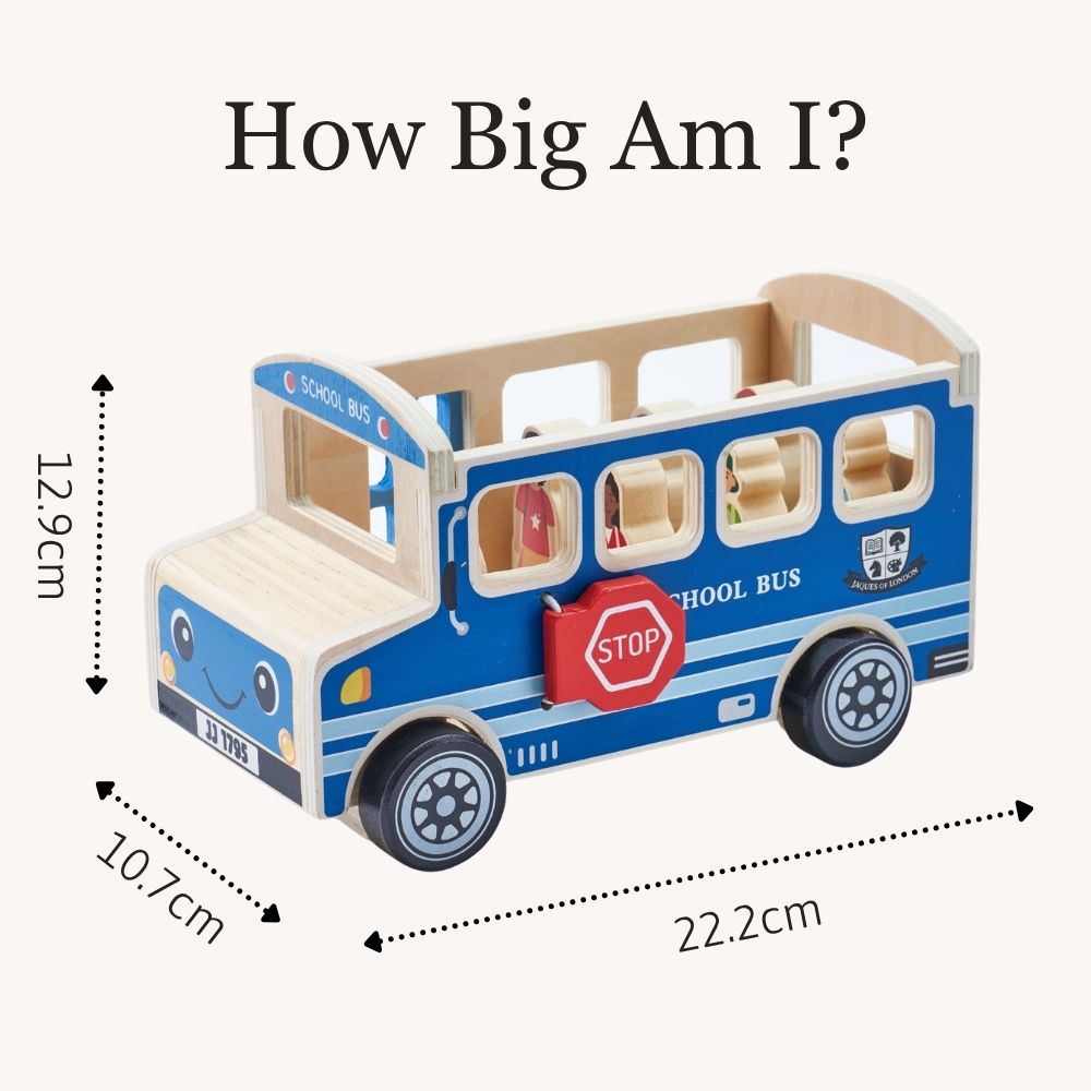 A wooden toy school bus shown on a light beige background with measurement arrows and labels indicating its dimensions: 12.9 cm height, 10. 