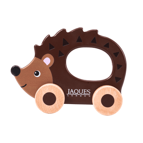 Hedgehog-shaped toy with wheels on a transparent background [fill]