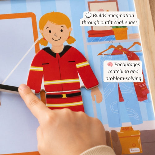 A close-up of a children's interactive book or toy page showing a finger pointing at a cardboard firefighter doll in a red uniform. A hand is visible holding a black stylus or pointer, and the page includes text callouts about building imagination and encouraging matching and problem-solving.