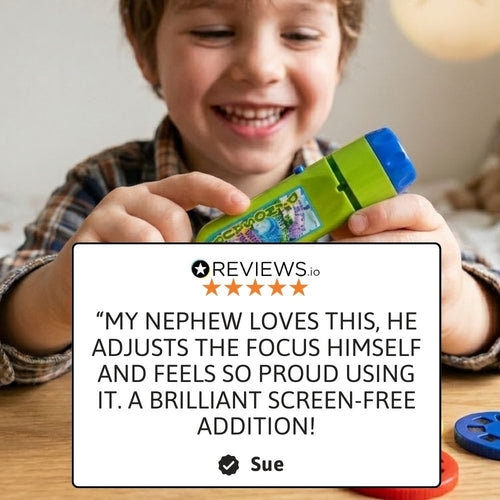Child using dinosaur projector torch and adjusting focus for screen-free play 