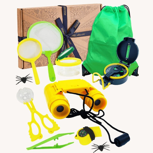 Close-up of the exploration tools including binoculars, net, jars and compass 