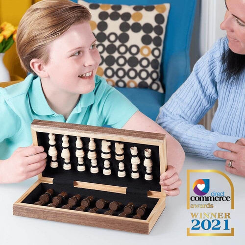  Child opening portable chess board