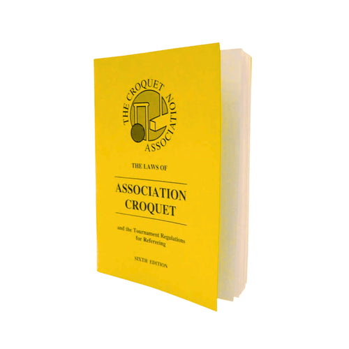 Yellow book titled 'The Laws of Association Croquet' on a white background [fill]