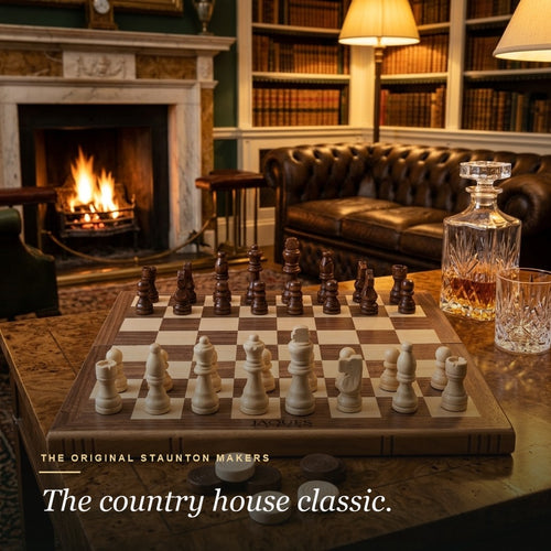 Jaques folding chess and draughts set in an English country-house drawing room by the fire 