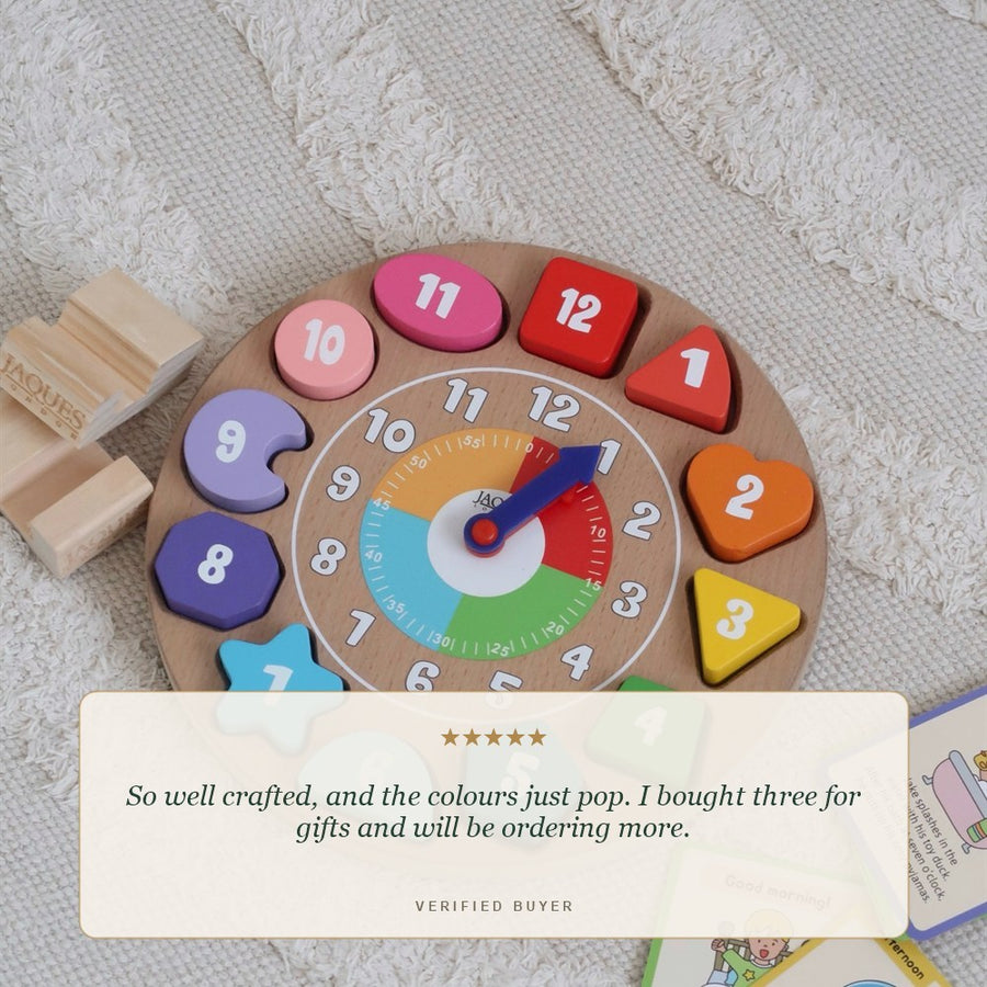 Five star review of the Jaques of London wooden shape sorting clock, so well crafted with colours that pop [fill]