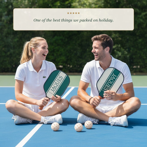 Two friends laughing with Jaques pickleball paddles, five star review one of the best things we packed on holiday 