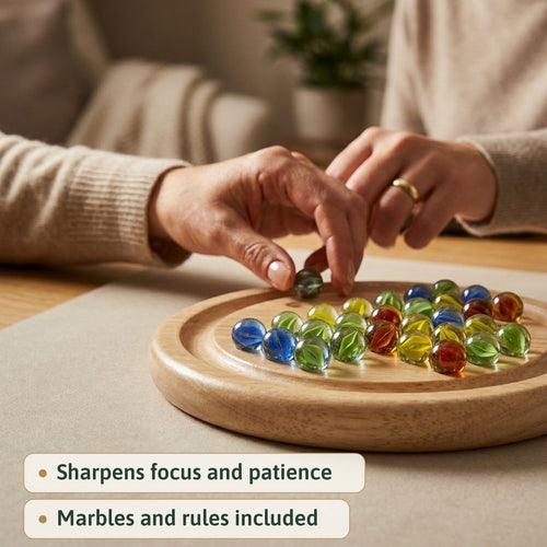 Close up of the coloured glass marbles on the Jaques solitaire board 