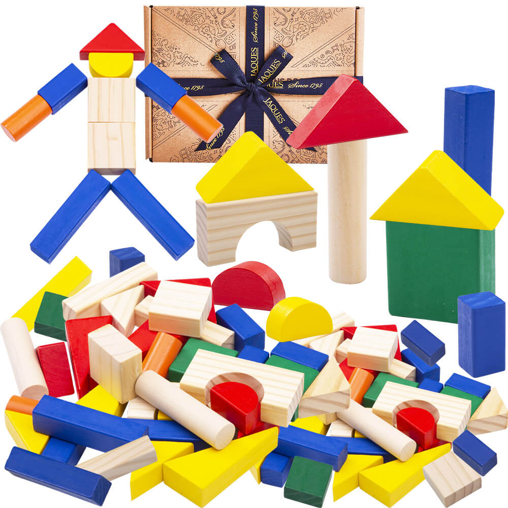 Building Blocks tumbled on the floor and one making a shape of a person 