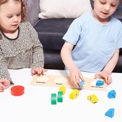  Children organising fractions on the board